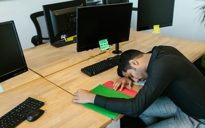 Person working at computer needing a break