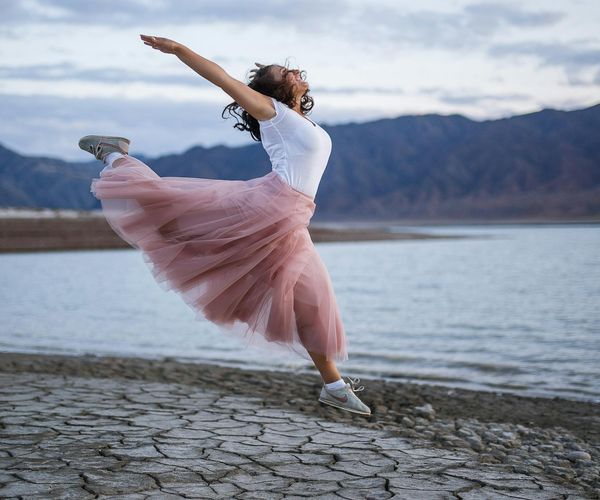 Smiling woman feeling energetic and balanced